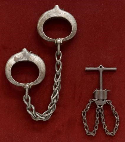 Appraisal: pair Italian iron legs irons and hand cuffs c the