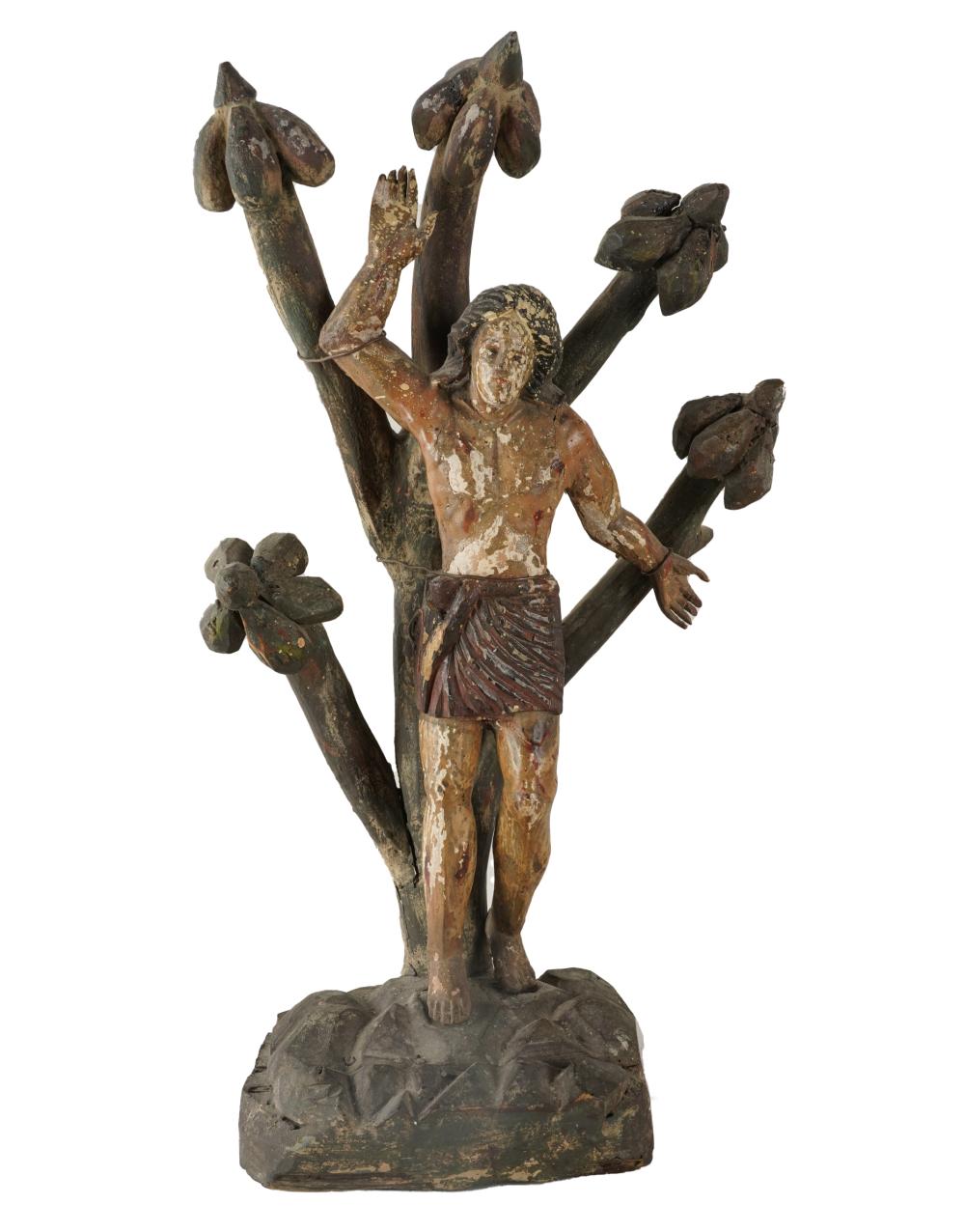 Appraisal: SPANISH COLONIAL CARVED SAINT SEBASTIANcarved and polychrome wood Condition losses