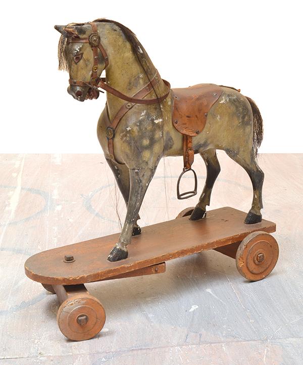 Appraisal: SMALL ANTIQUE CHILD'S DAPPLE GREY ROCKING HORSE ON CASTORS CM