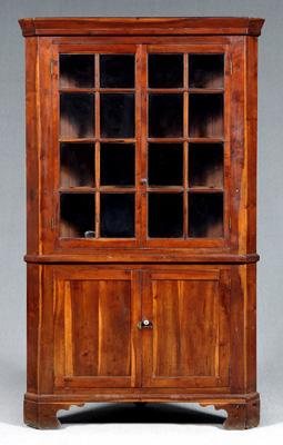 Appraisal: East Tennessee cherry corner cupboard one-case construction figured cherry with