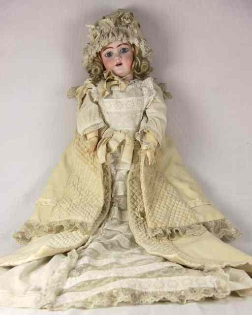 Appraisal: A Heinrich Handwerck bisque head doll impressed mark with blue