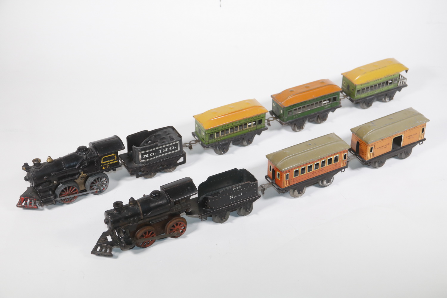 Appraisal: IVES WIND-UP TOY TRAINS WITH CAST IRON LOCOMOTIVES TIN LITHO