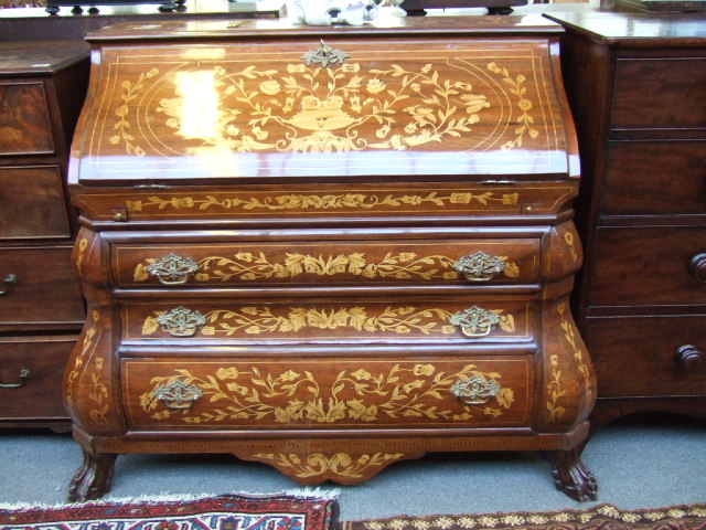 Appraisal: An th century style Dutch marquetry bureau the serpentine fall