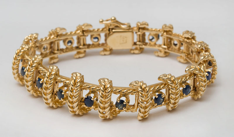 Appraisal: K GOLD AND SAPPHIRE BRACELET Set with round cut sapphires