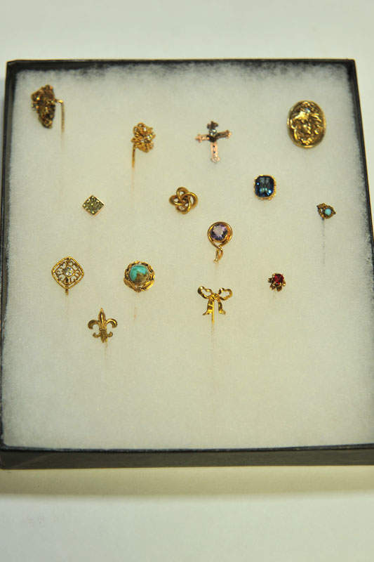 Appraisal: FOURTEEN STICK PINS Seven marked '' K'' one with diamond