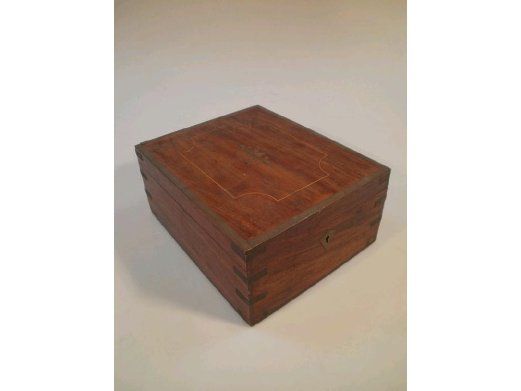 Appraisal: A Victorian mahogany workbox having a lift top with easel