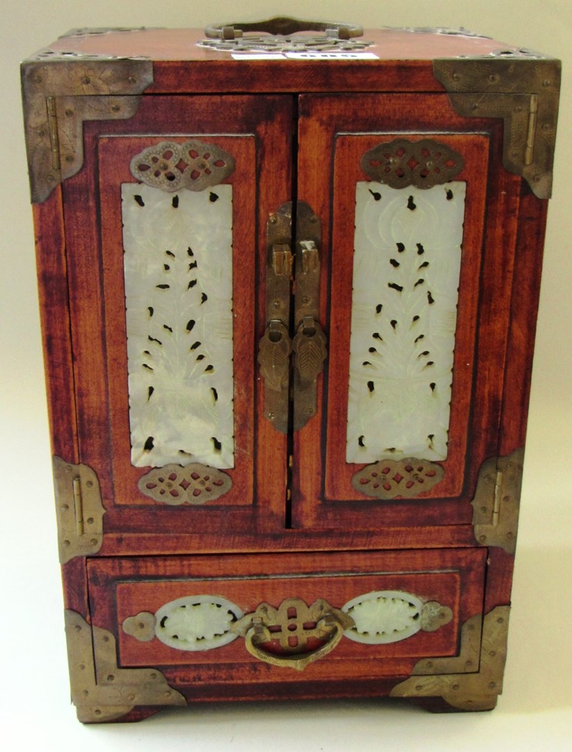 Appraisal: A th century Eastern hardwood and carved stone two door