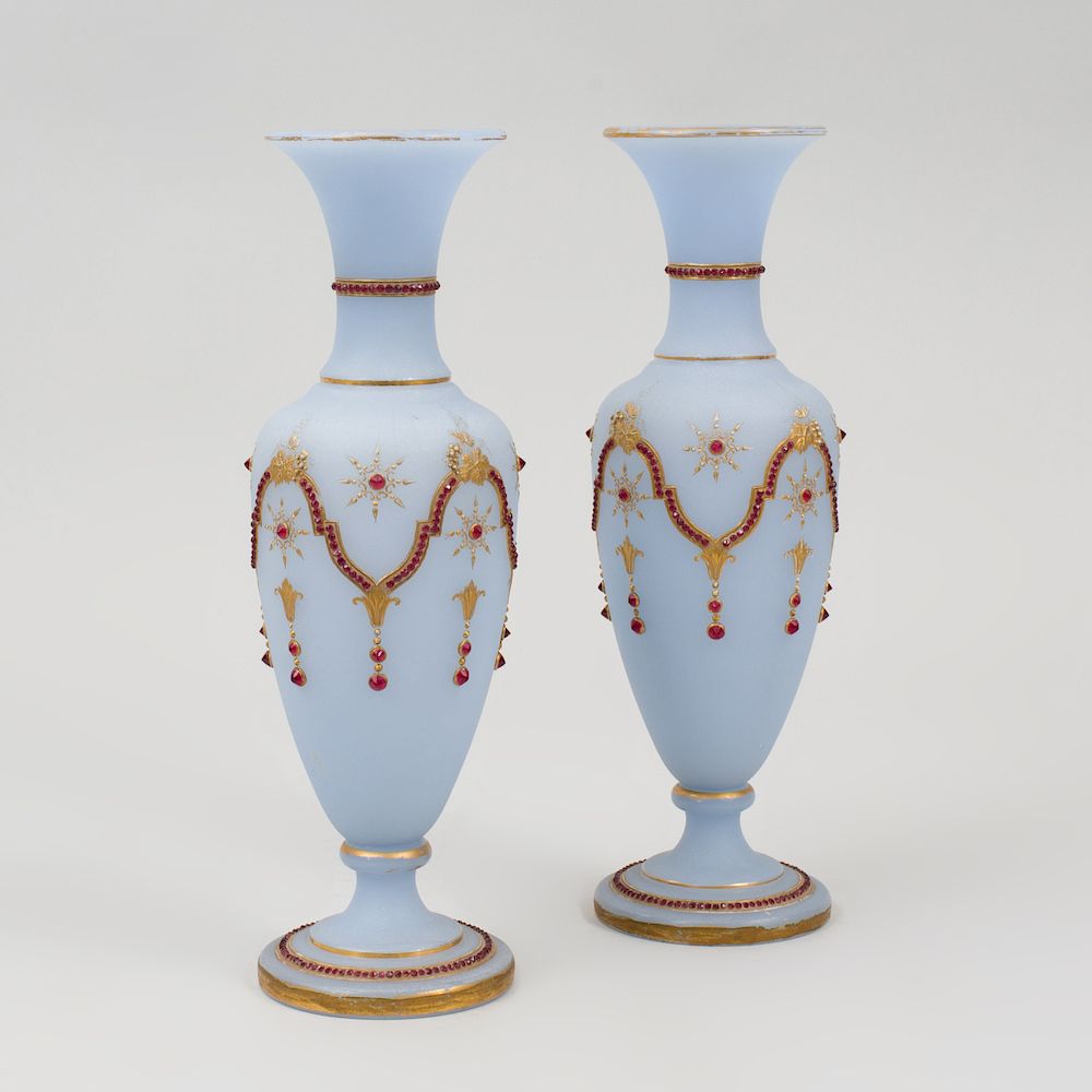 Appraisal: Pair of Gilt-Decorated Light Blue Glass Vases with Applied Glass