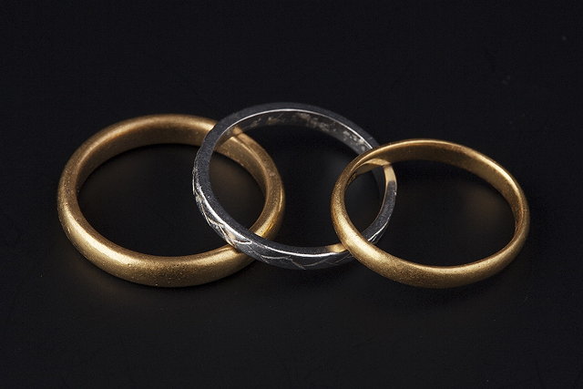 Appraisal: THREE WEDDING BANDS comprising two ct gold wedding bands and