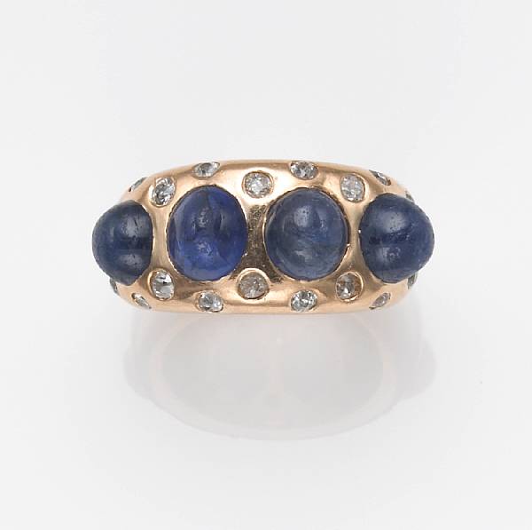 Appraisal: A cabochon sapphire diamond and k gold ring Seaman Schepps