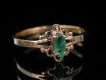 Appraisal: Ladies' Emerald Gold Ring A k yellow gold ring with