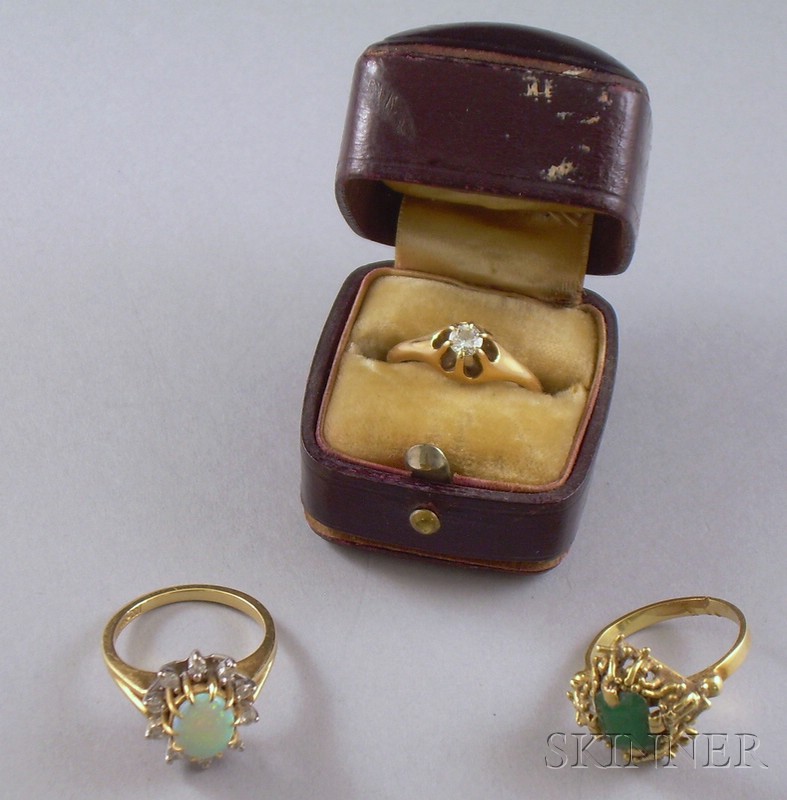 Appraisal: Three kt Gold Rings including a gold and diamond solitaire