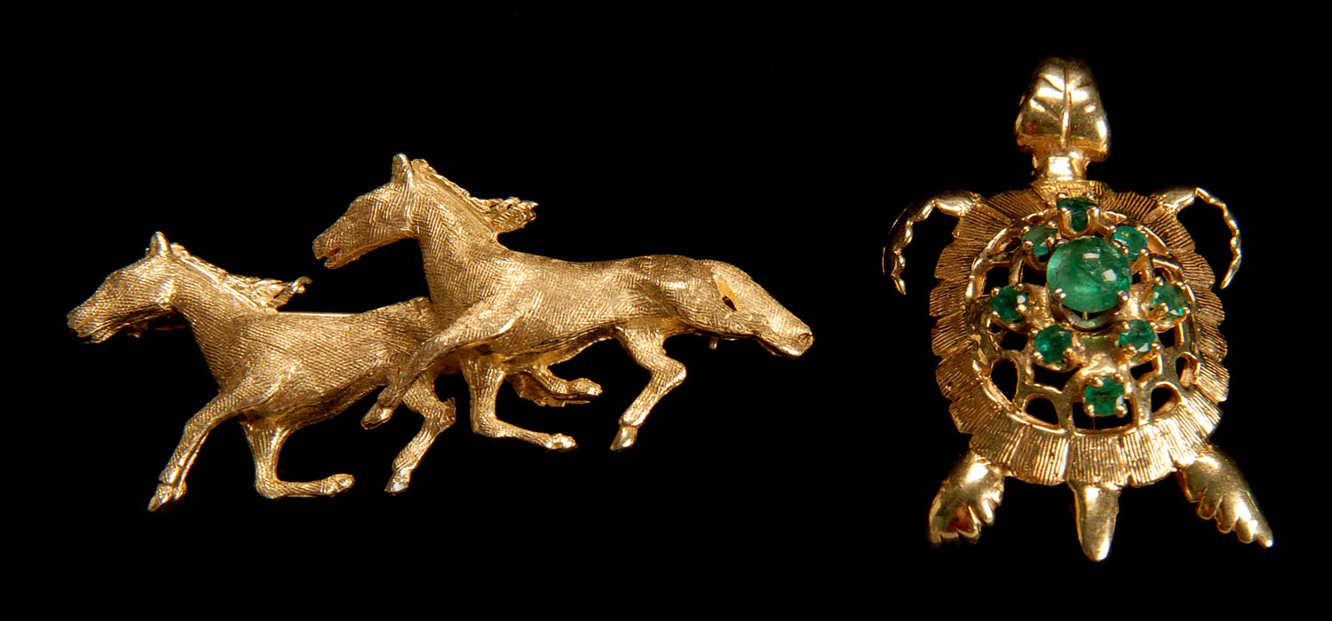 Appraisal: TWO KT YELLOW GOLD PINS One in the form of