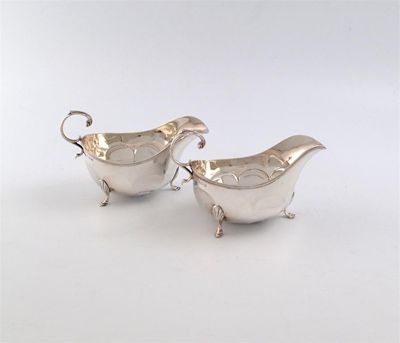 Appraisal: A pair of silver sauce boats by Mappin and Webb