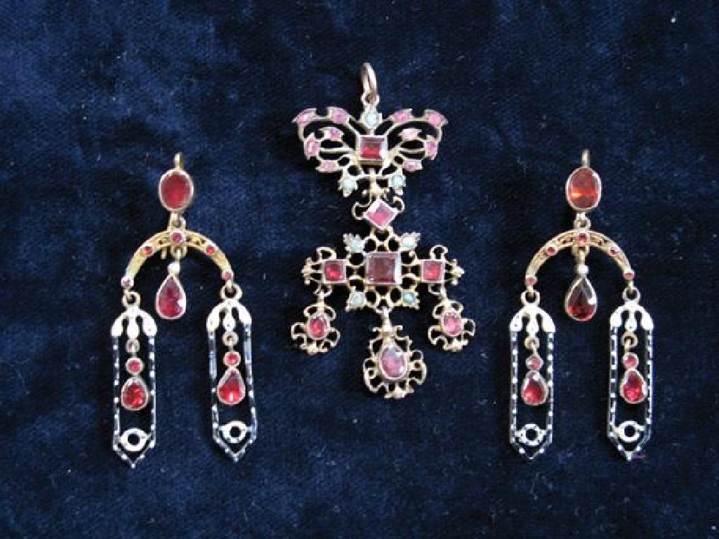 Appraisal: AN EARLY TH CENTURY DEMI PARURE comprising a pendant in