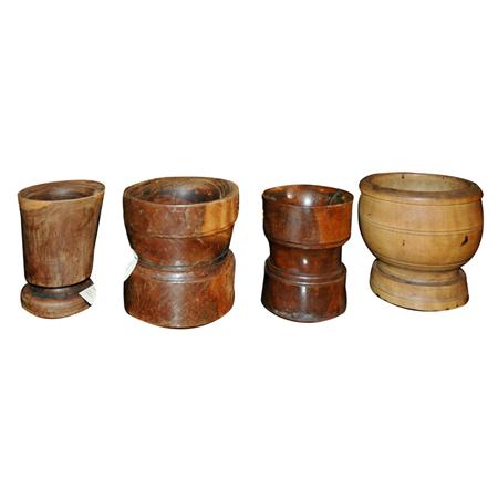 Appraisal: Group of Four Wood Mortars Estimate -