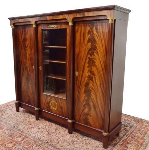 Appraisal: French Empire style mahogany bookcase th c cornice top above