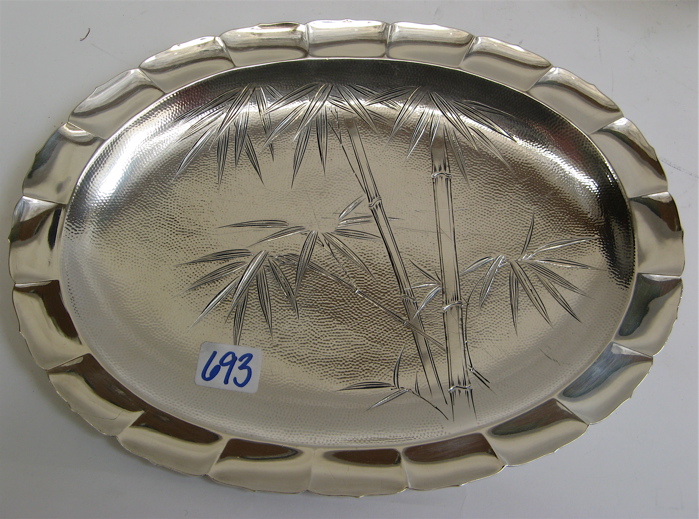 Appraisal: A JAPANESE STERLING SERVING TRAY oval with scalloped border hammered