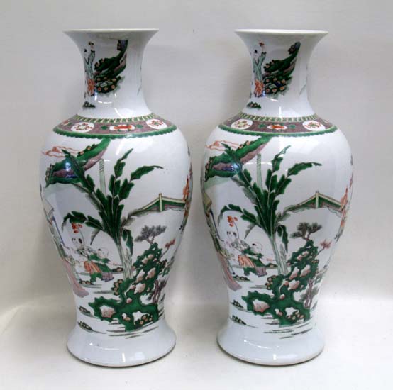 Appraisal: PAIR OF CHINESE FAMILLE ROSE VASES having baluster form and