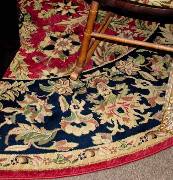 Appraisal: Machine-made circular-form rug approximately feet in diameter Estimate - No