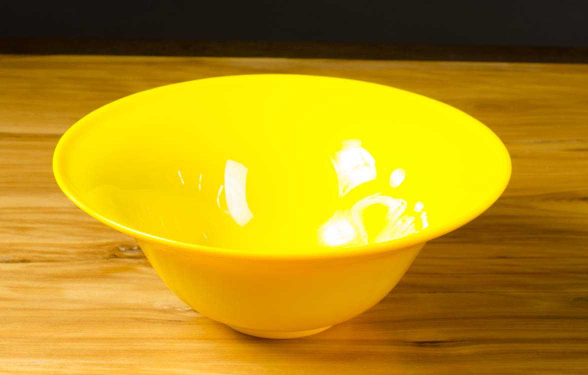 Appraisal: CHINESE IMPERIAL YELLOW PEKING GLASS BOWL with flared rim and