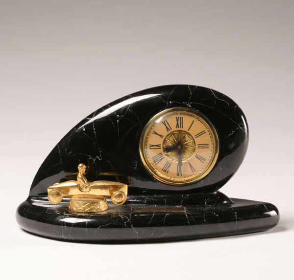 Appraisal: Lanshire electric clock aero form with attached soap box racer