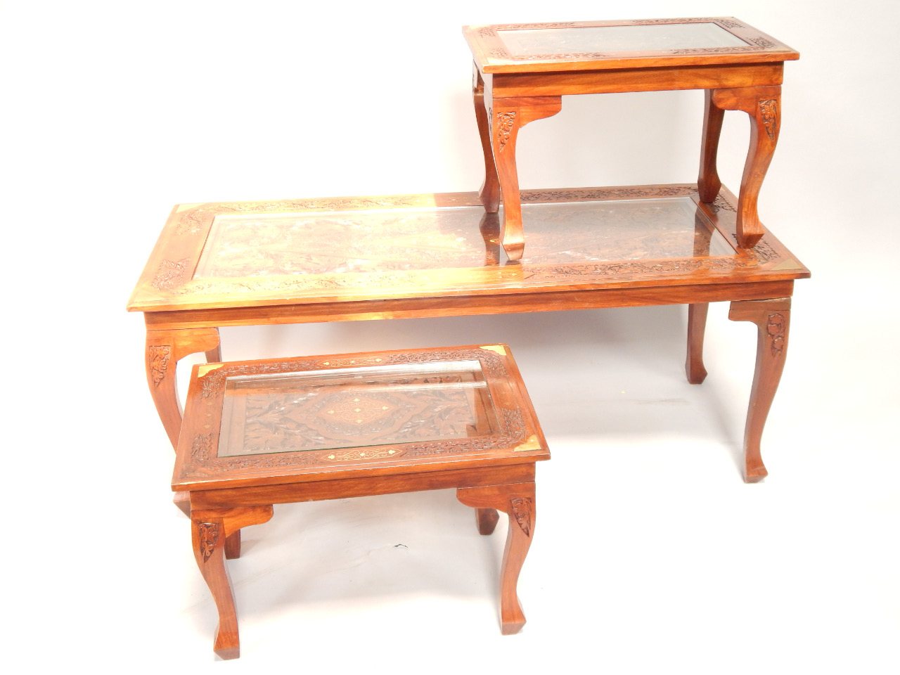 Appraisal: A trio of oriental inlaid mahogany glass topped tables with