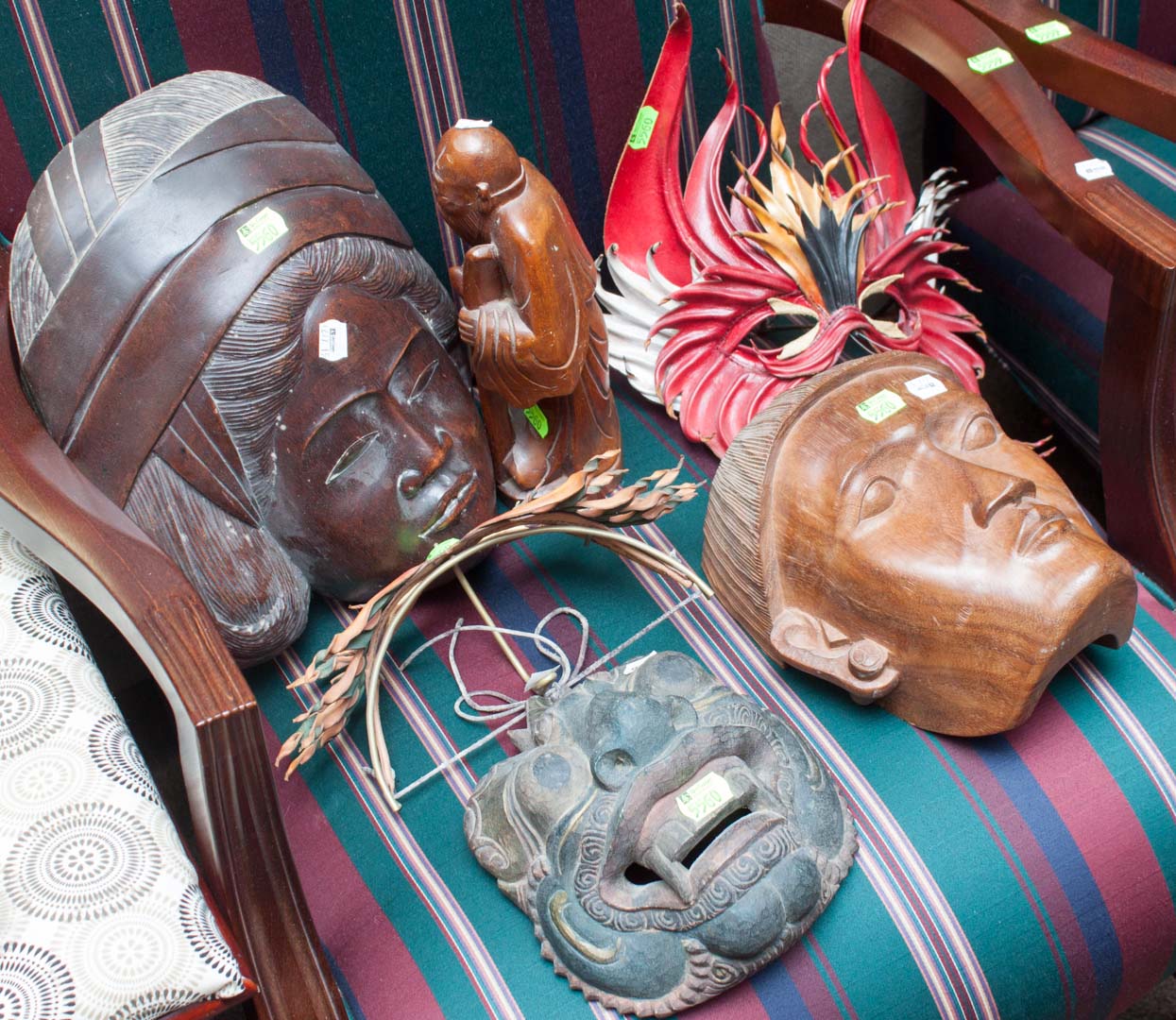 Appraisal: Assorted wood and leather masks including two leather masks three