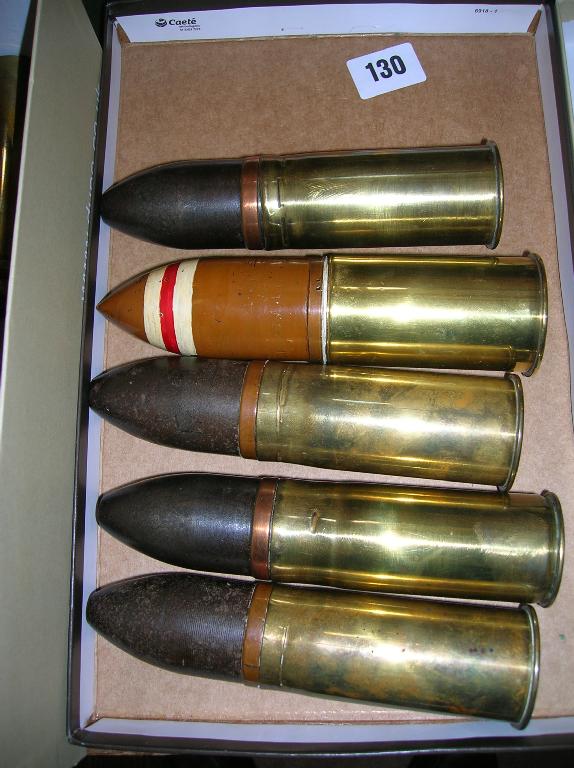 Appraisal: Four mm German pom-pom cartridges together with a mm pom-pom