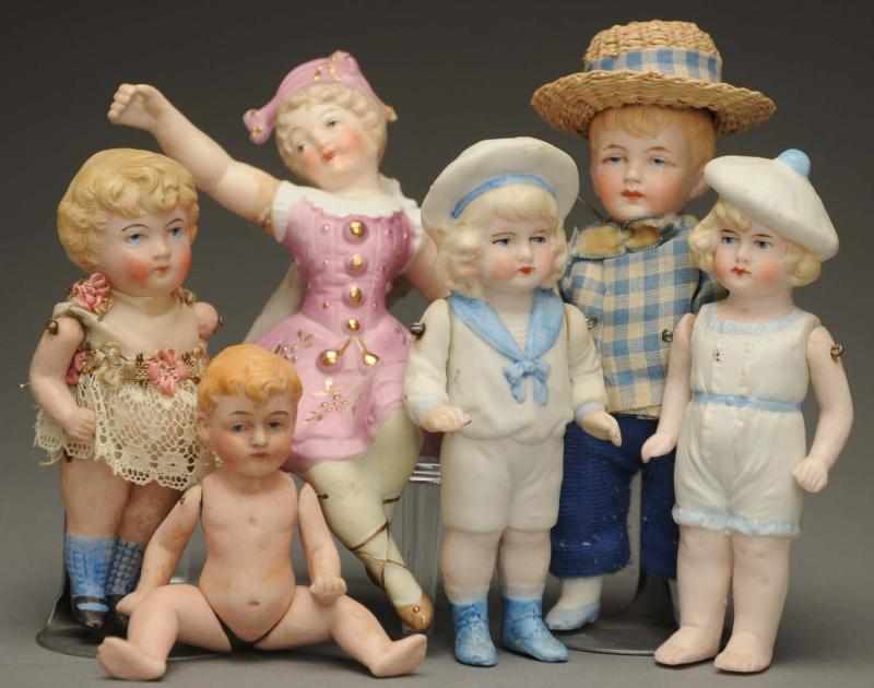 Appraisal: Lot of All Bisque Dolls German bisque items sailor boy