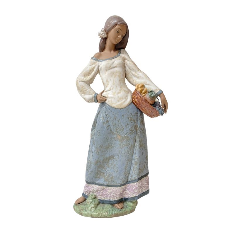 Appraisal: Lladro Seasonal Gifts Woman Figurine Lladro Seasonal Gifts Woman Figurine