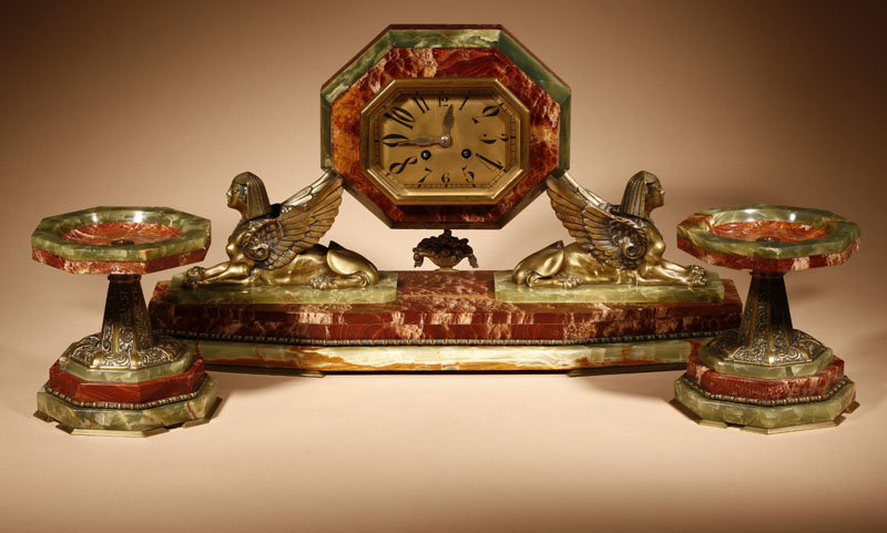 Appraisal: An Art Deco 'Egyptian' gilt bronze-mounted green and red onyx