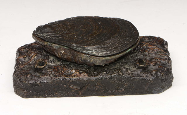 Appraisal: A BRONZE INKWELL in the form of a seashell with