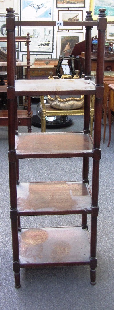 Appraisal: A th century mahogany five tier whatnot with turned supports