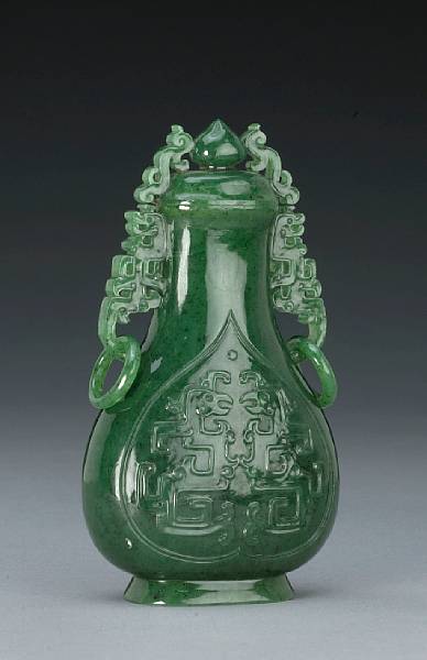 Appraisal: A small 'spinach' jade covered vase Of flattened pear shape