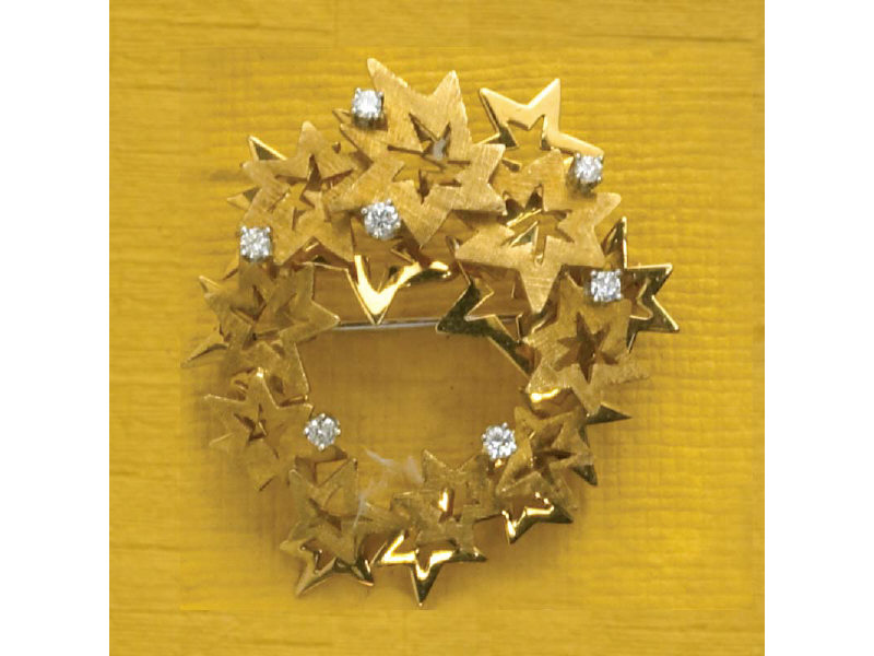 Appraisal: K YELLOW GOLD DIAMOND BROOCH Star design pin set with