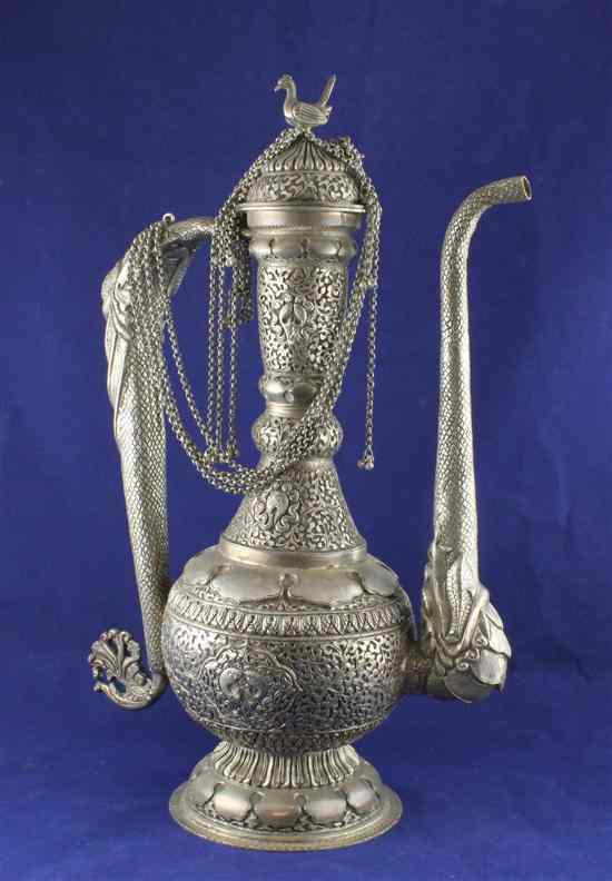 Appraisal: An Indian white metal ewer and cover of baluster form