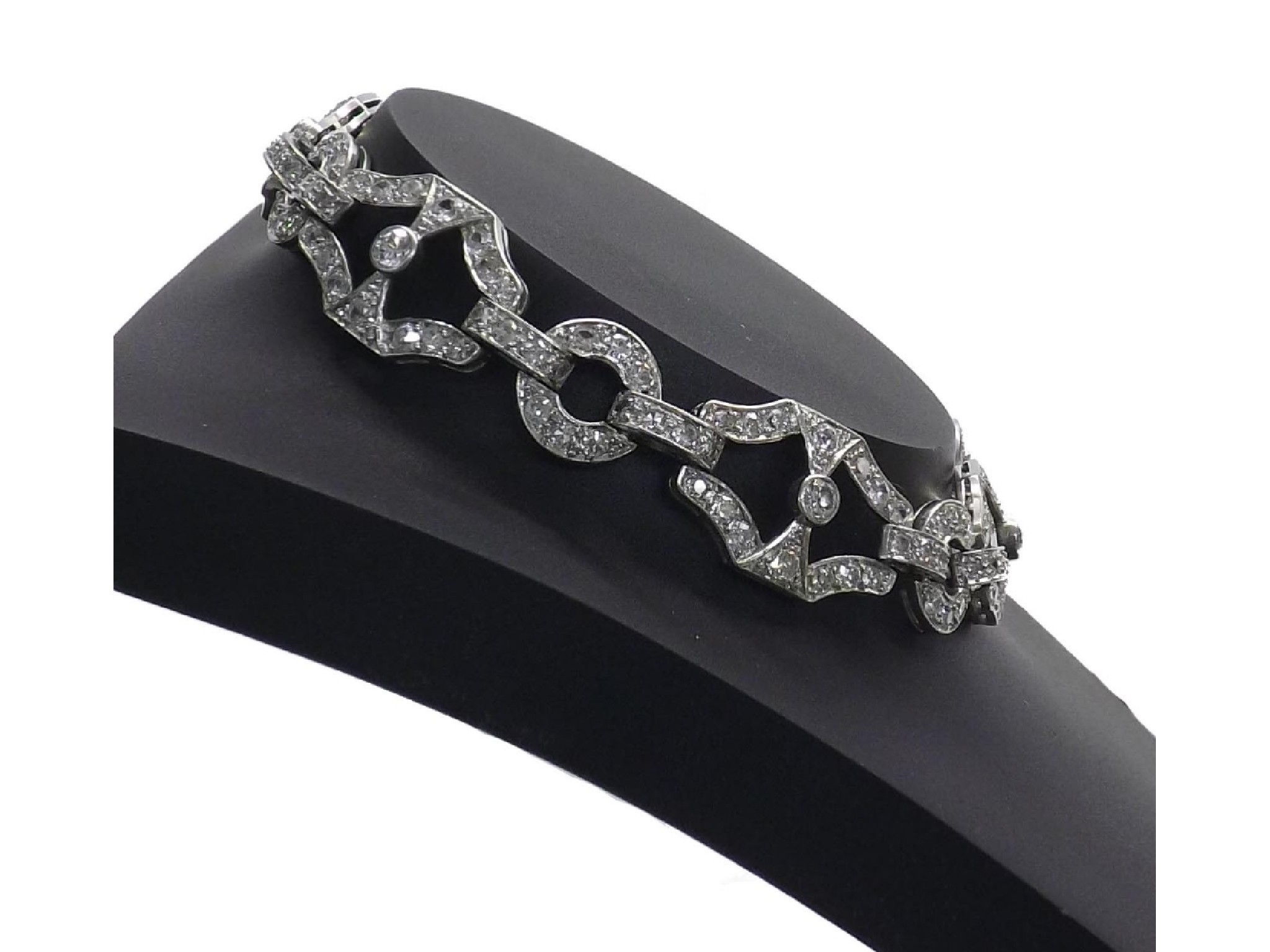 Appraisal: Fine platinum diamond link bracelet with six canted oval openwork