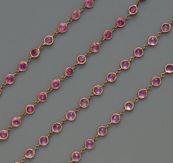 Appraisal: A pink sapphire long chain mounted in eighteen karat pink