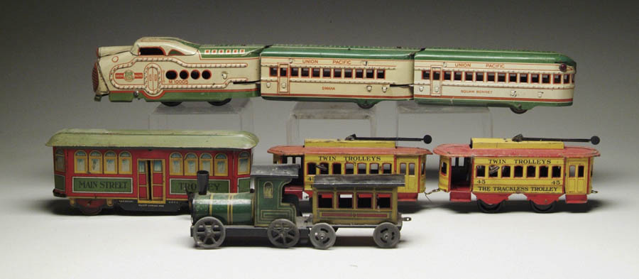 Appraisal: LARGE LOT OF TRAINS AND TROLLEYS Includes three Strauss twin