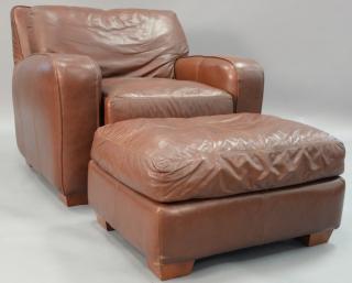 Appraisal: Large brown leather upholstered club chair with matching ottoman Large