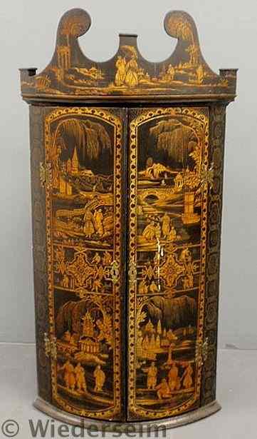 Appraisal: English japanned half-round hanging cupboard th c with a broken