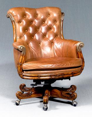 Appraisal: Maitland-Smith swiveling desk chair tufted leather back and arms brass