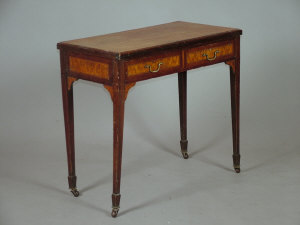 Appraisal: A late Victorian mahogany foldover card table with inlaid and