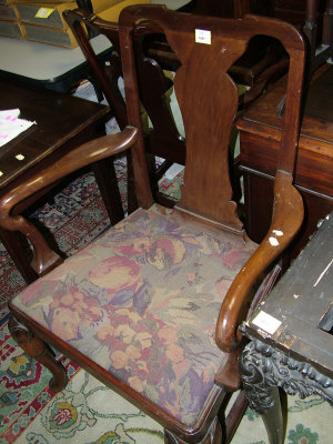 Appraisal: A George III mahogany open armchair with vase shaped back