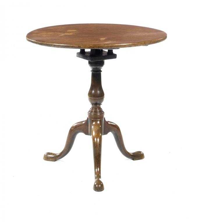 Appraisal: A GEORGE III MAHOGANY TRIPOD TABLE the circular top on