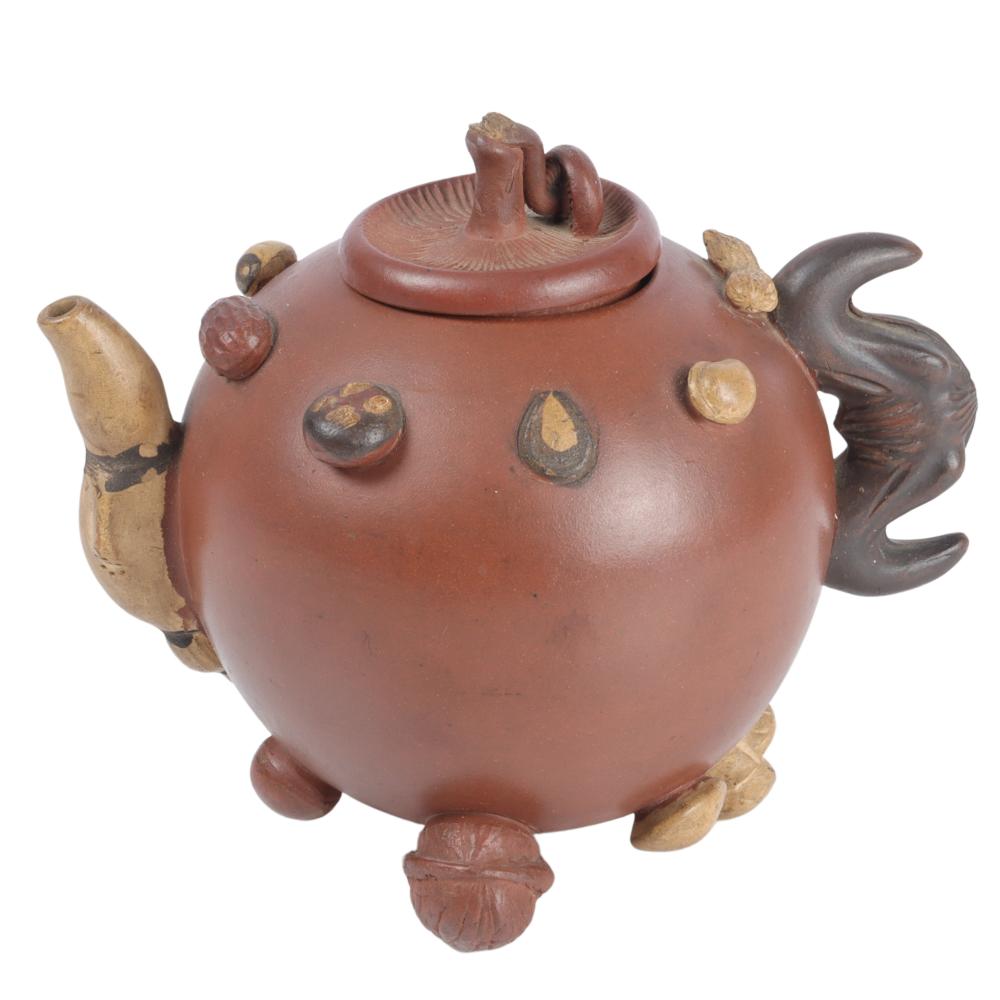 Appraisal: CHINESE REPUBLIC YIXING NUT AND SEED CLAY TEAPOT H X