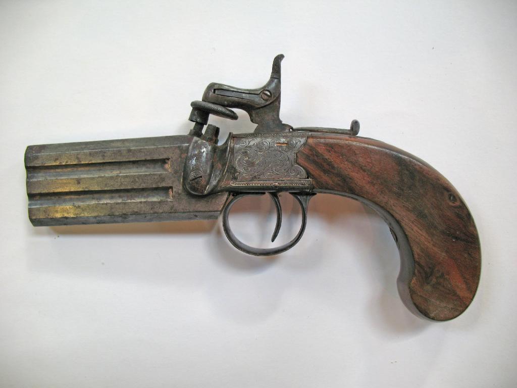 Appraisal: A THREE BARRELLED PERCUSSION CAP FIRING PISTOL by J Eadon