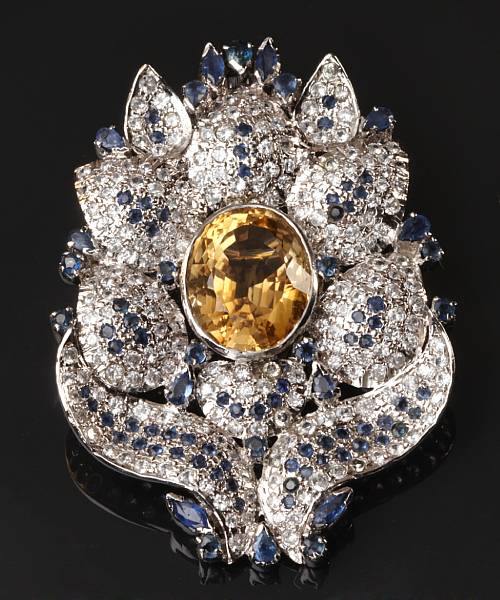 Appraisal: A citrine blue and white sapphire and silver brooch converts