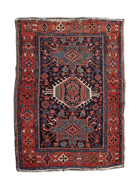 Appraisal: A MIDDLE EASTERN RED AND BLUE GROUND RUG with a